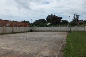 The unused basketball court.