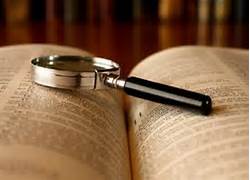 magnifying glass on scripture
