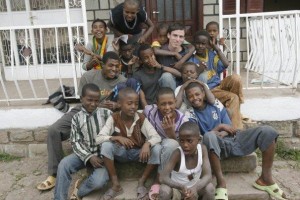 A group of former street kids from Addis Ababa, Ethiopia live in a home with Jason Burton (right of center). The organization which Jason founded is Yehiwot Reay, or "Vision of Life."
